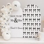 עמדת צילום מסיבת רווקים/ת דגם פפיונים שחור לבן